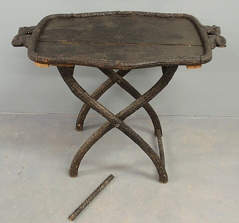 Black Forest carved tray-top table