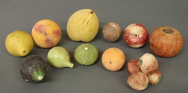 Group of eleven pieces of stone fruit-