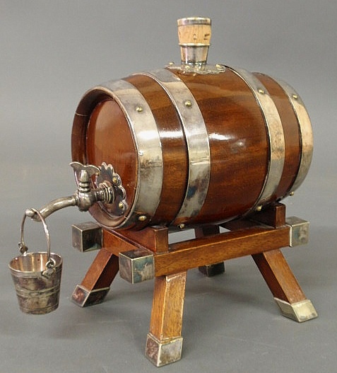 Mahogany and silver banded whiskey barrel