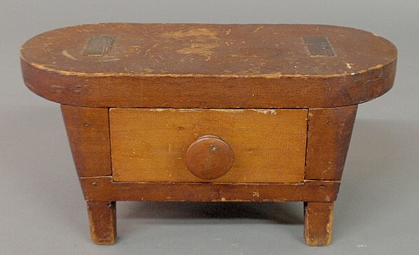 Unusual small stool with a drawer