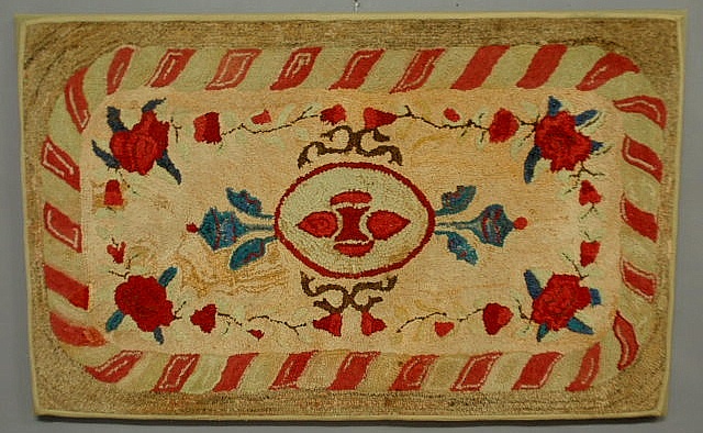 Colorful hooked rug with overall 15b228