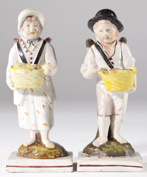 Pair of Early Staffordshire Winged 15b576