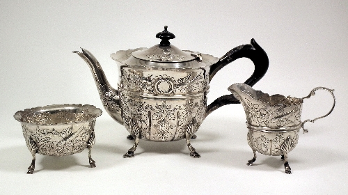 An Edward VII silver circular teapot