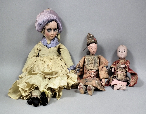 A 19th Century Chinese doll with composition