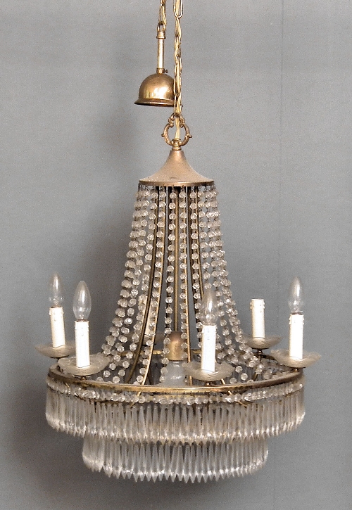 A brass framed six light chandelier
