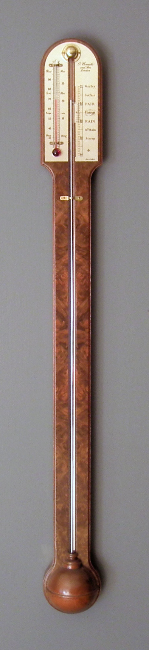 A modern burr walnut stick barometer