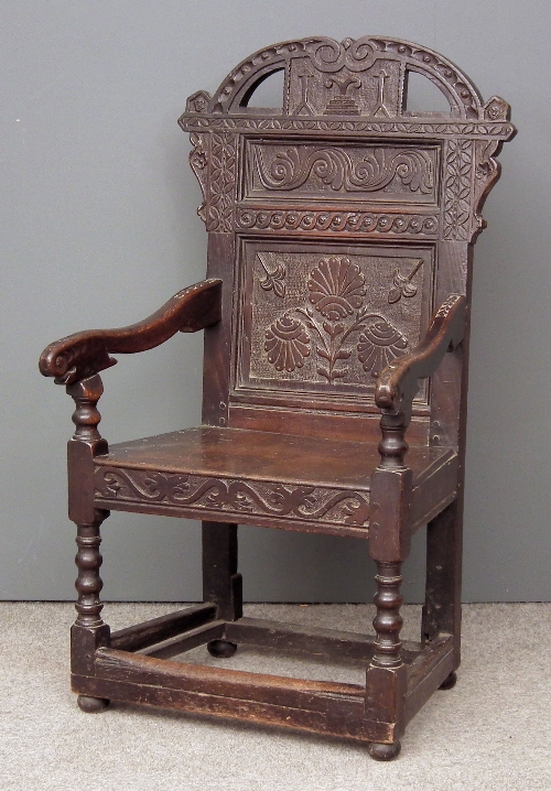 A 17th Century oak high back armchair 15b9be