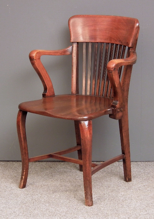 A 1920s mahogany office chair with