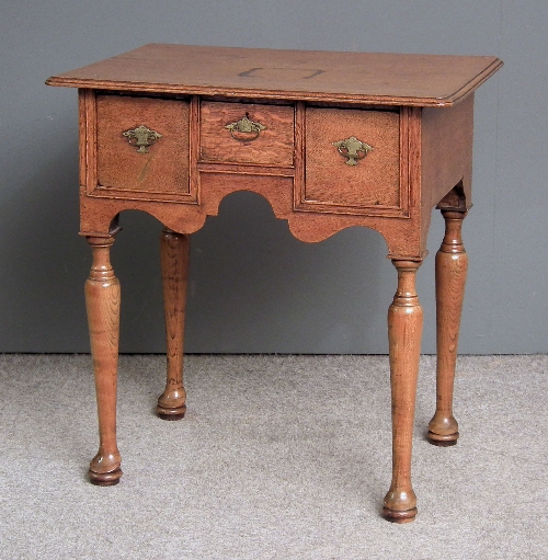 An 18th Century oak lowboy the 15b9f8