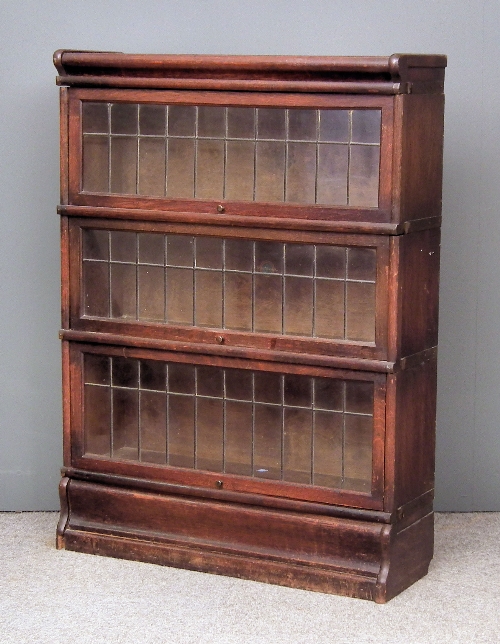 A 1930s Globe Wernicke oak three tier