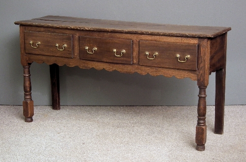 An old oak dresser base of 18th Century