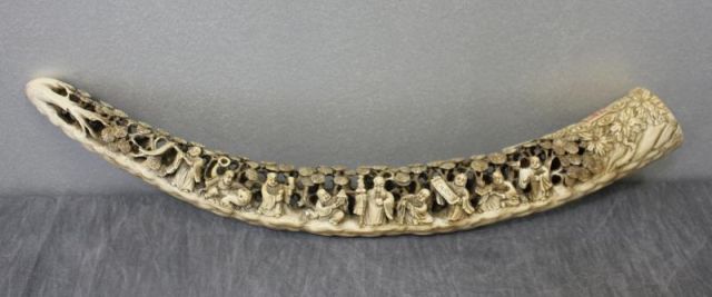 Ivory Asian Tusk with Figural Carvings.From