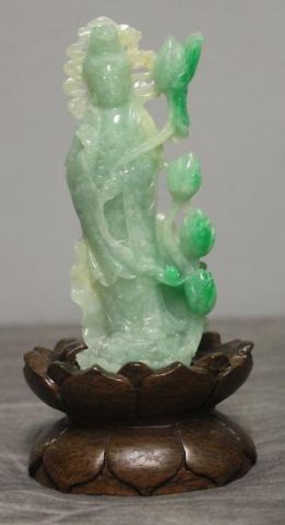 Jade Quan Yin on Wooden Stand.From a
