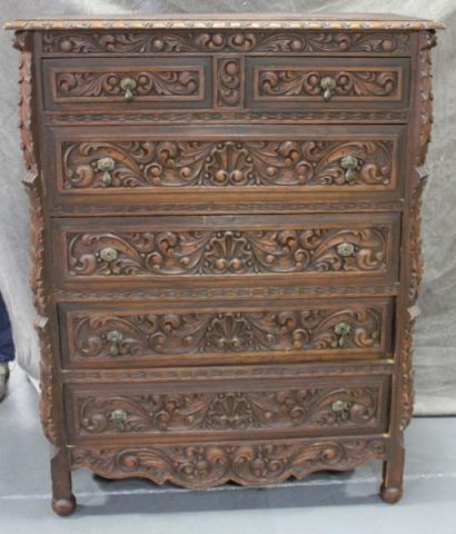 Highly Carved Tall Chest.From a Stamford