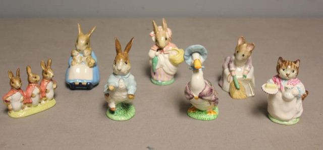 7 Beatrix Potter Porcelain Figures.From