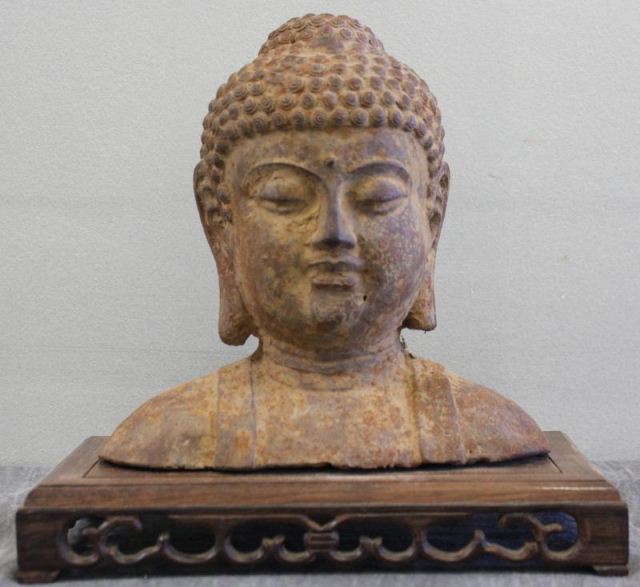 Antique Asian Buddha on Hardwood