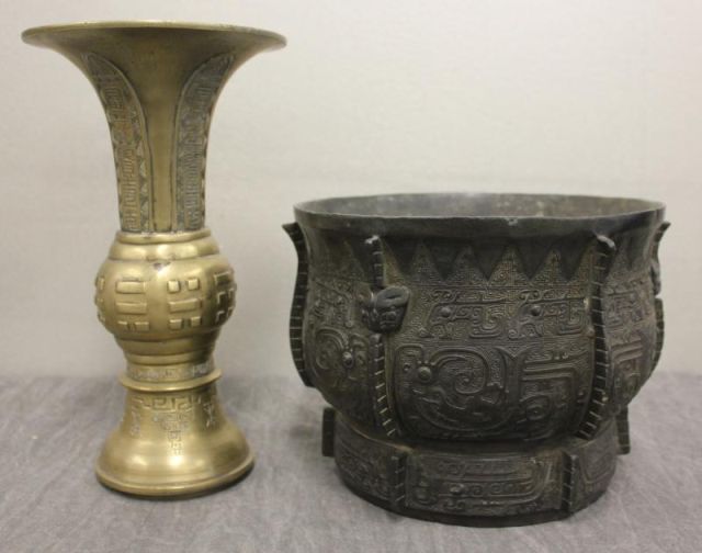 Bronze Bowl with a Tall Bronze Vase.From