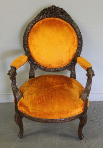 Finely Carved and Upholstered Arm Chair.With