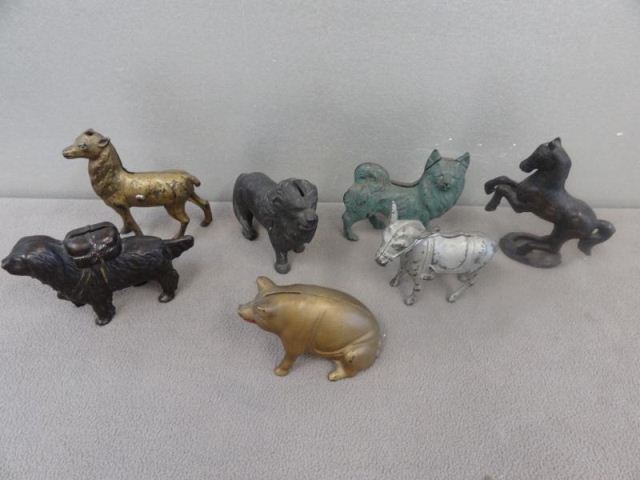 7 Vintage Cast Iron Animal Banks.From