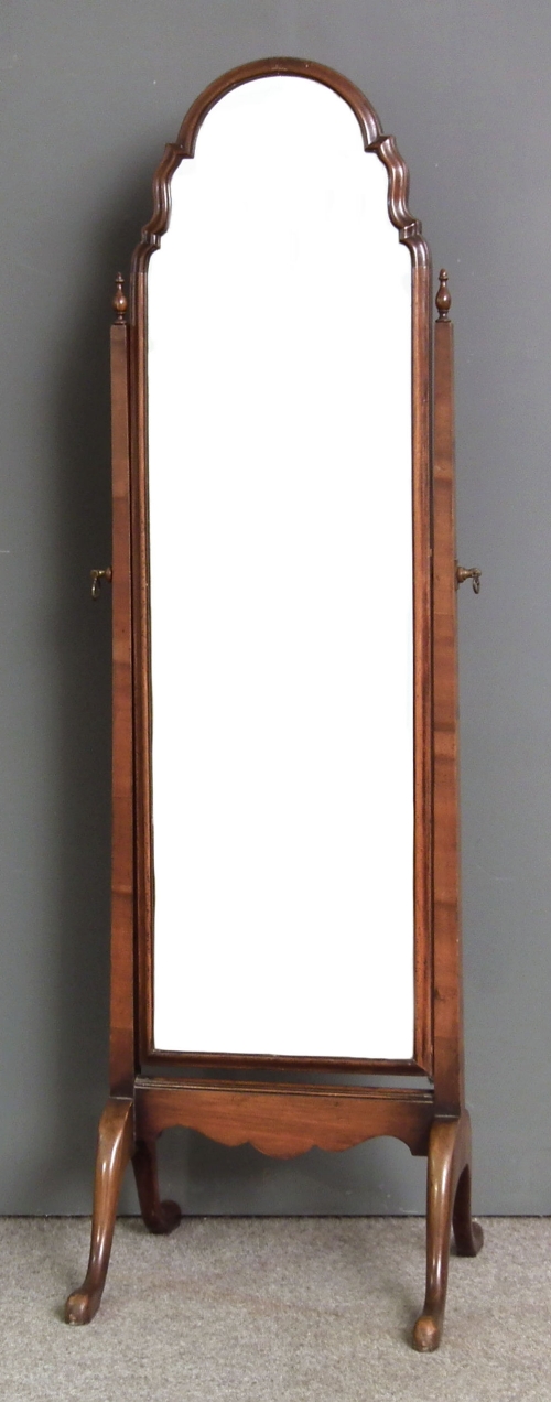 A 1930s walnut framed cheval mirror