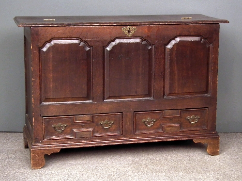 A mid 18th Century panelled oak