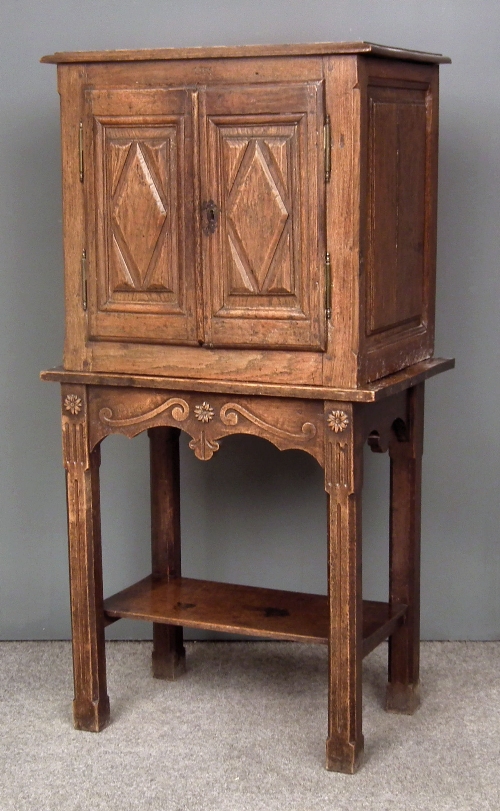 A French panelled oak cabinet fitted 15d259