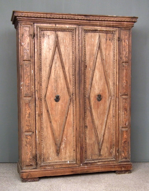 An old Continental walnut armoire