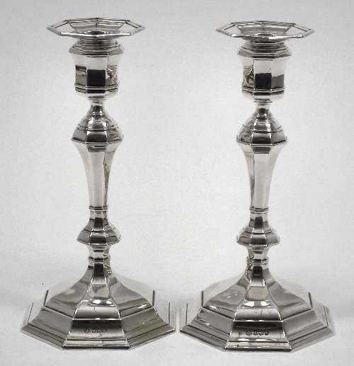 Two George VI silver pillar candlesticks