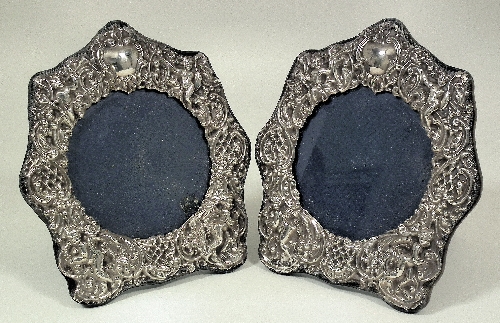 A pair of Elizabeth II silver repousse 15d386