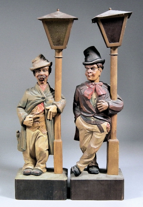 A pair of Continental carved and painted