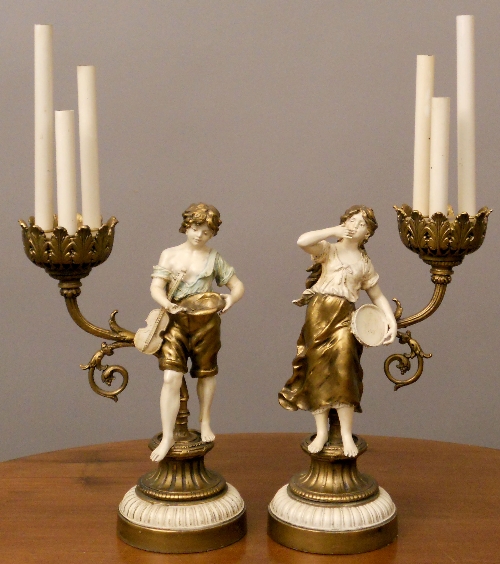 A pair of gilt and painted metal