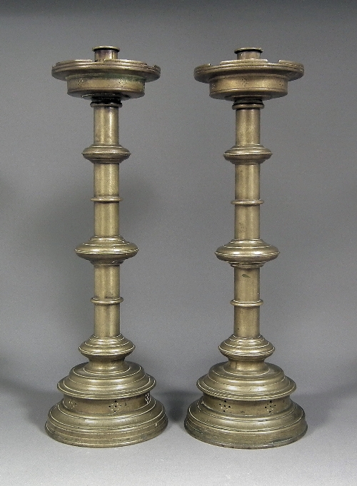 A pair of Victorian brass pillar