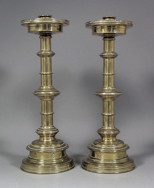 A pair of Victorian brass pillar