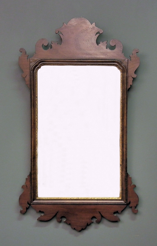 A mahogany rectangular wall mirror 15d4a3