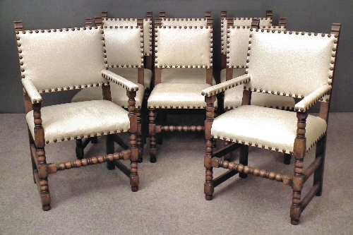 A set of eight oak dining chairs