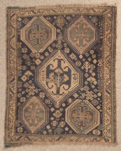 An antique North west Persian rug 15d4f2