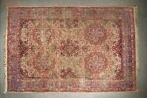 An early 20th Century Kerman carpet 15d4f5