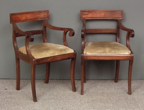 A pair of George III mahogany armchairs