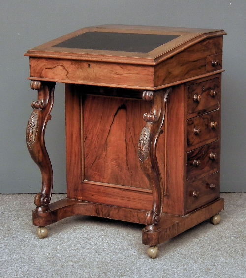 A Victorian walnut Davenport slope