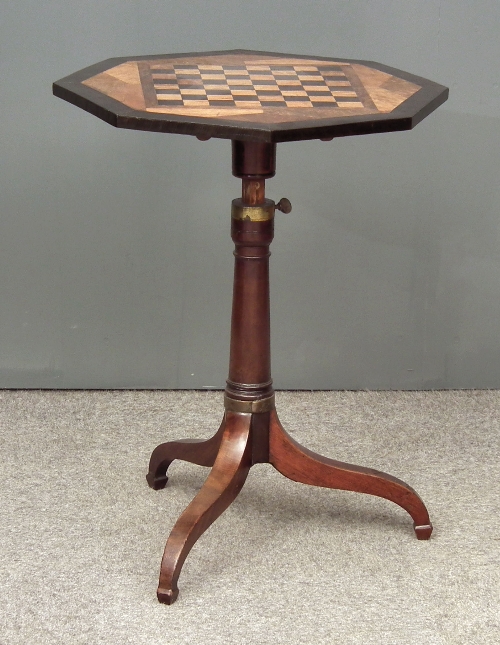 A mahogany octagonal tripod table