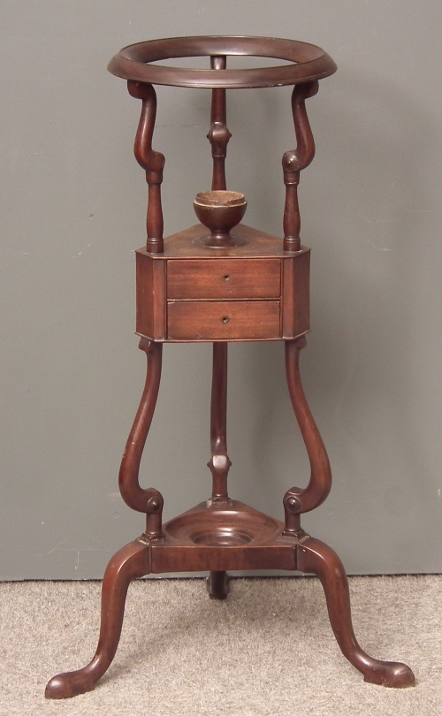 A George III mahogany three tier