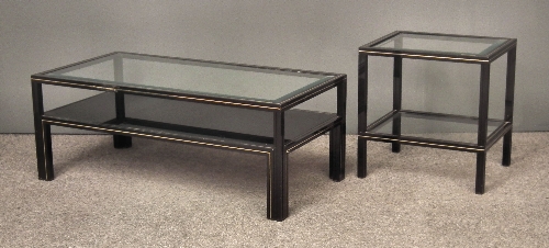 A modern ebonised and gilt decorated