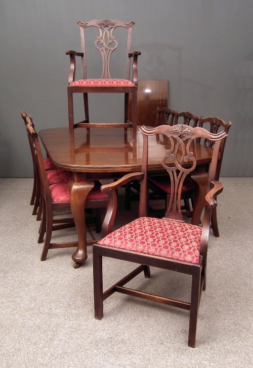 A 1920s mahogany oval extending dining