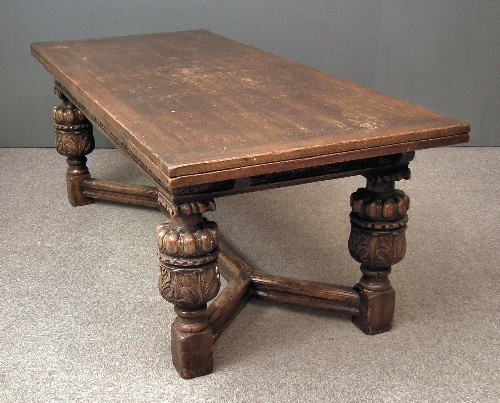 An oak draw-leaf refectory table