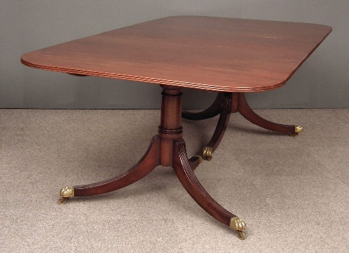 A mahogany twin pedestal dining table