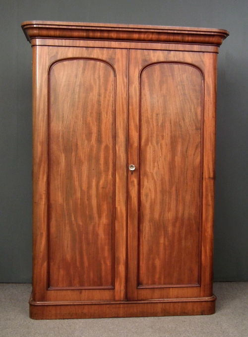 A Victorian figured mahogany wardrobe