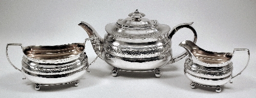 A George III silver three piece tea