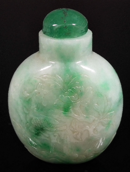 A Chinese green and white jadeite 15d8f3
