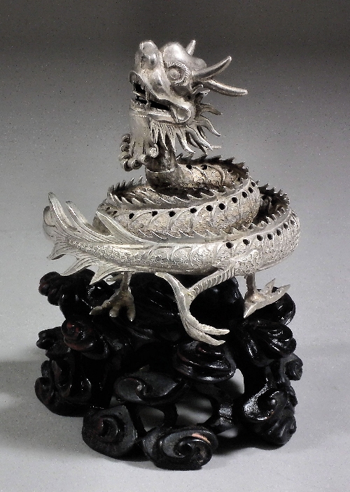 A Chinese silvery metal figure of a