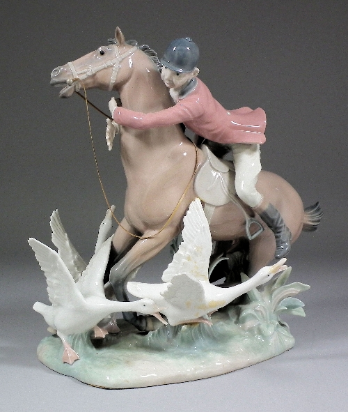 A modern Lladro porcelain group of a